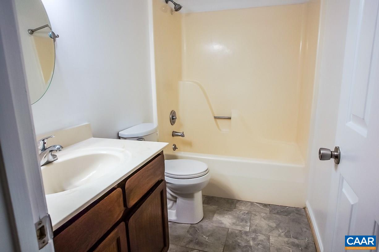 346 Westfield Road Charlottesville, VA 22901 - Photo 14 of 18 a bathroom with a sink a toilet and shower