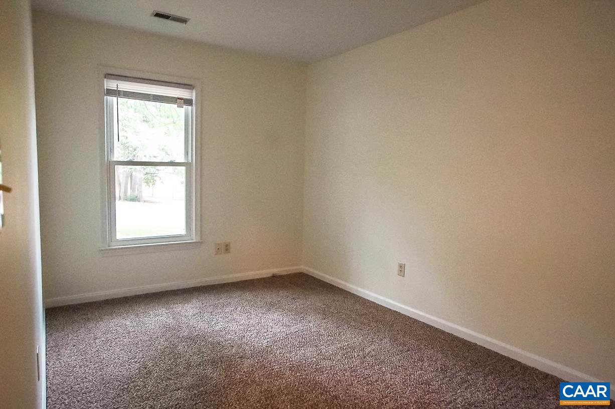 346 Westfield Road Charlottesville, VA 22901 - Photo 15 of 18 an empty room with a window