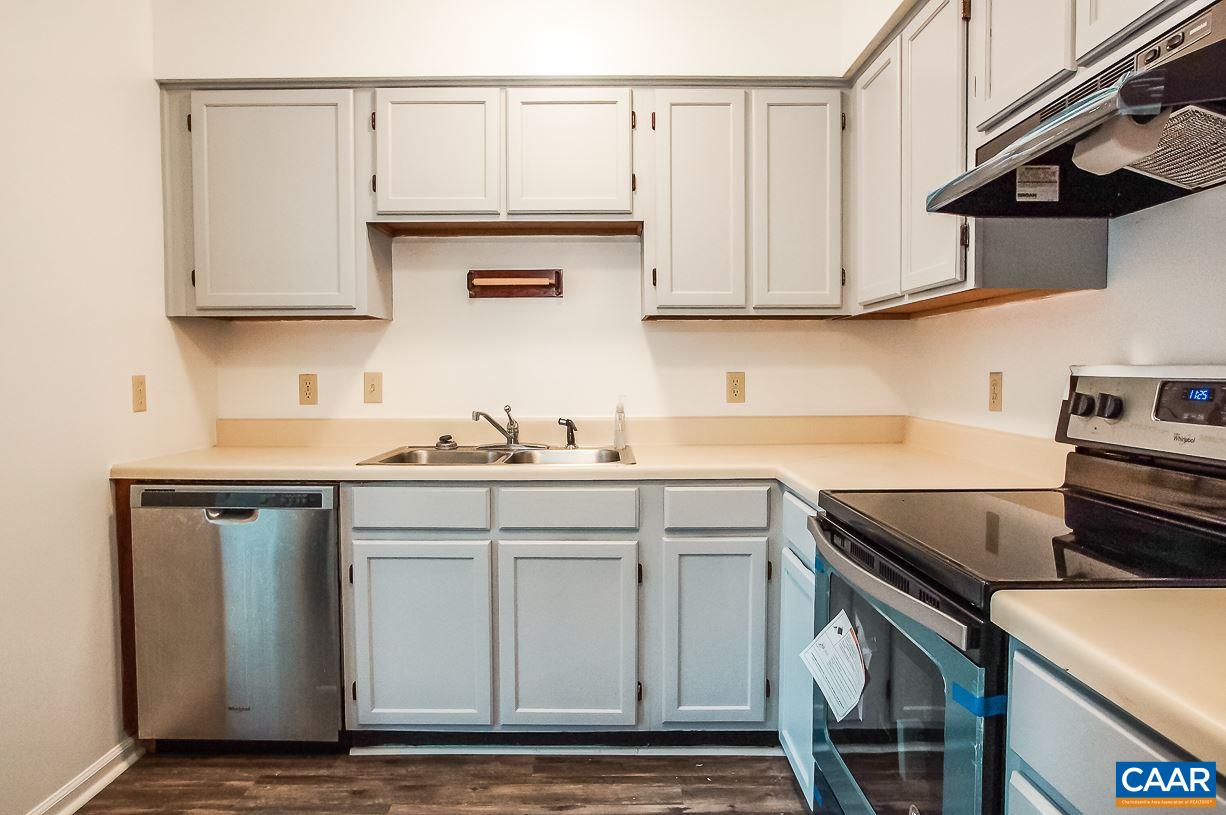 346 Westfield Road Charlottesville, VA 22901 - Photo 5 of 18 a kitchen with stainless steel appliances granite countertop a sink and a stove