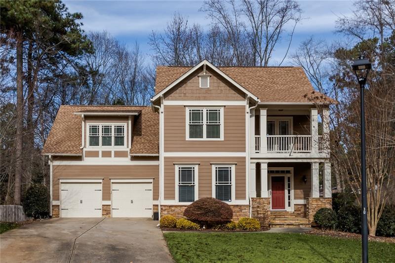 2782 Oak Village Trail Decatur, GA 30032 - Photo 1 of 1 a front view of a house with a yard and garage