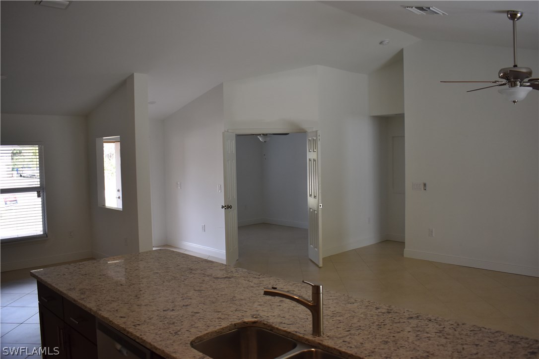 8152 Anhinga Road Fort Myers, FL 33967 - Photo 11 of 19 a room with a table and chairs