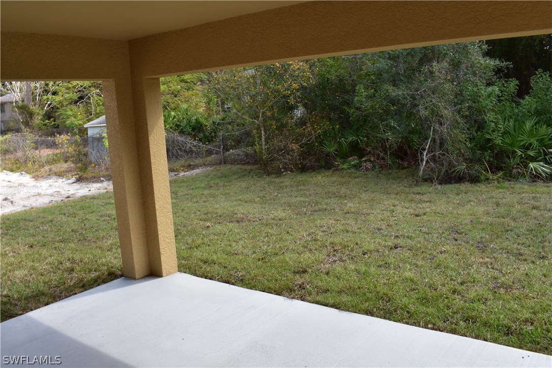 8152 Anhinga Road Fort Myers, FL 33967 - Photo 12 of 19 a view of a yard with potted plants