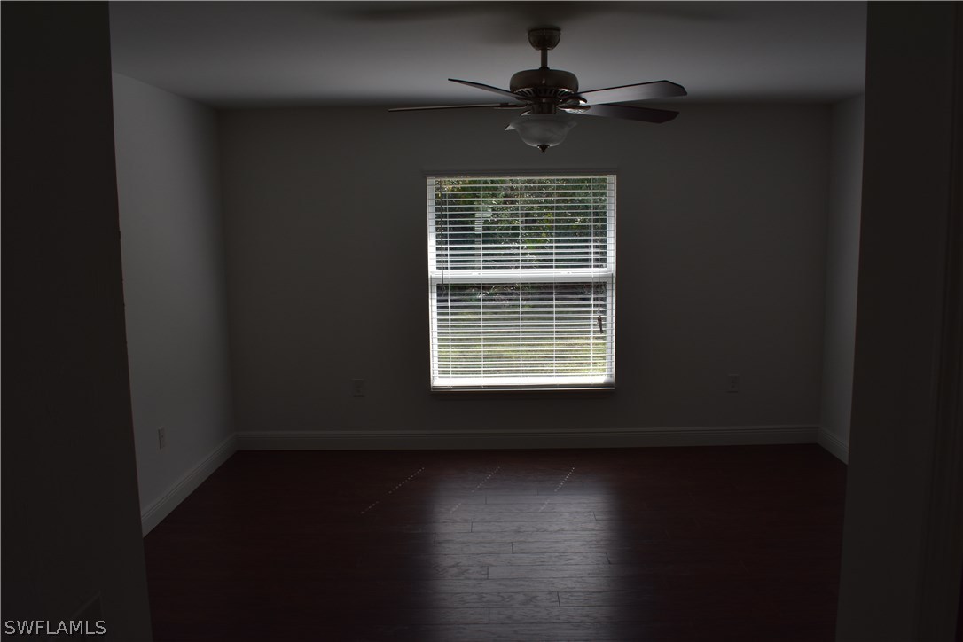 8152 Anhinga Road Fort Myers, FL 33967 - Photo 6 of 19 a view of an empty room with a window
