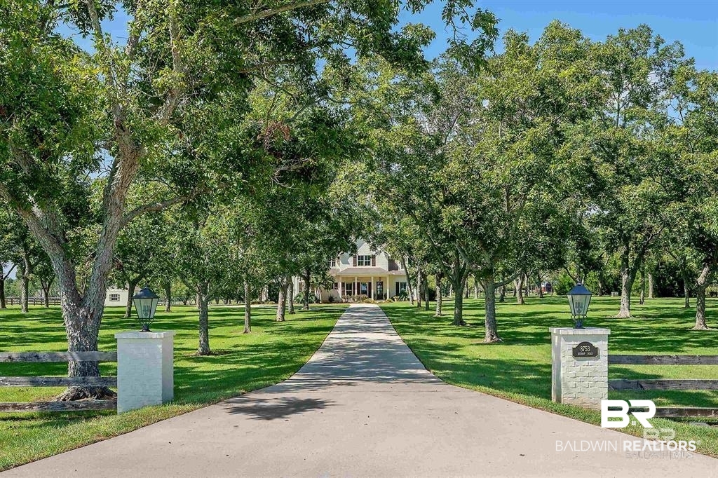 8753 Bishop Road Fairhope, AL 36532 - Photo 1 of 59 View of property's community with a porch