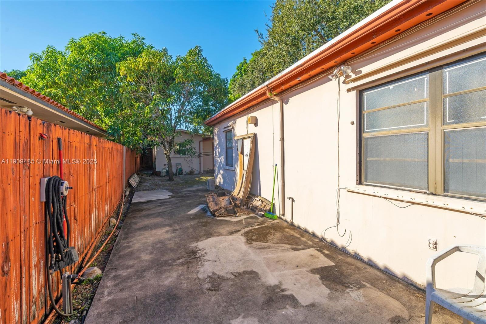 5834 Southwest 4th Street Miami, FL 33144 - Photo 19 of 33 a view of a house with a backyard