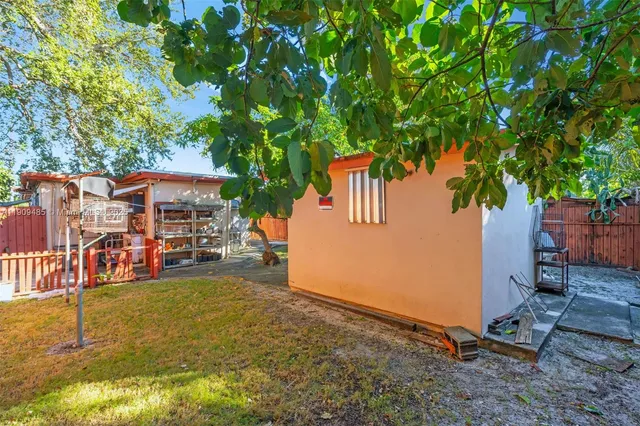 a view of a backyard with a patio