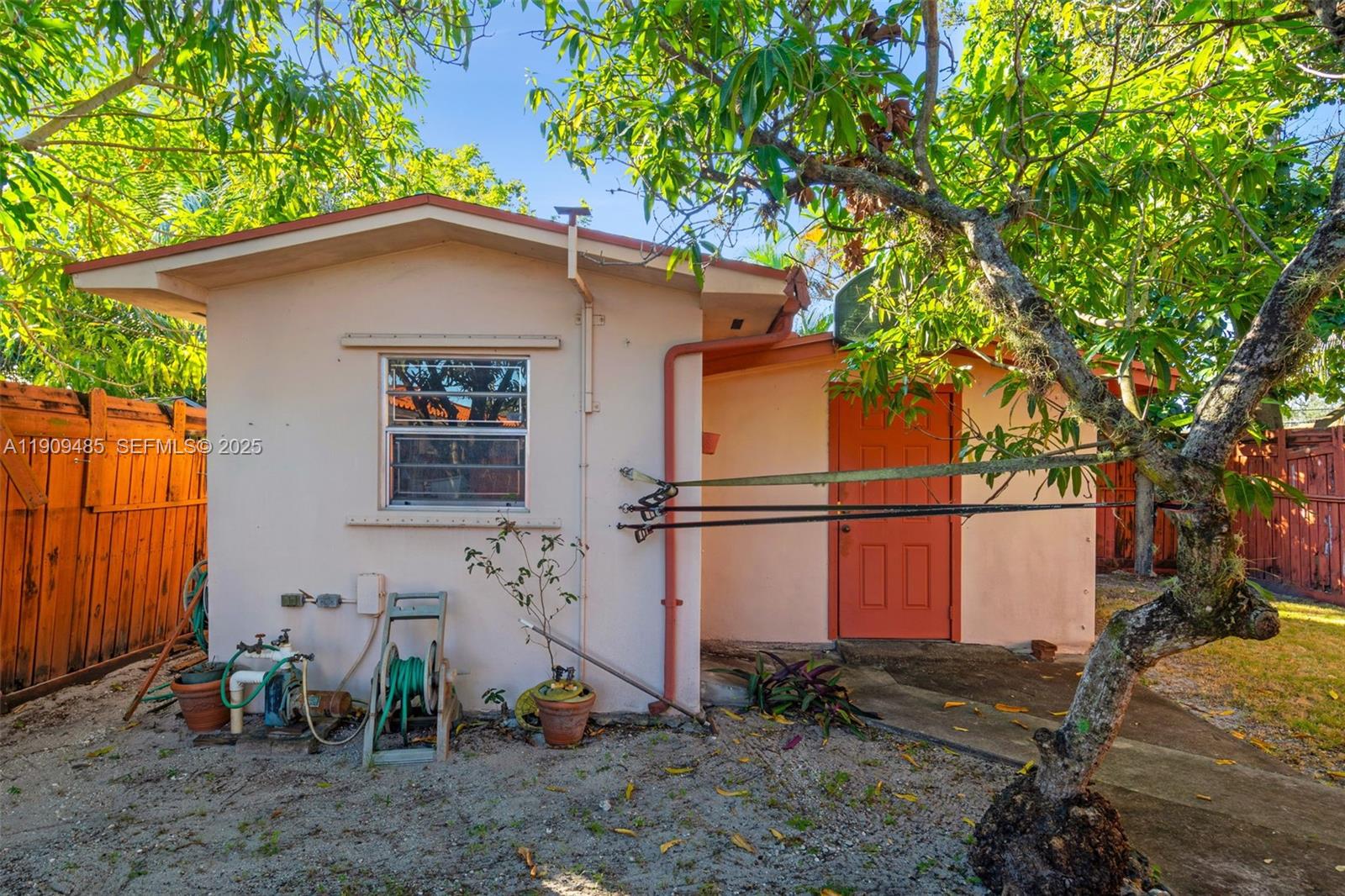 5834 Southwest 4th Street Miami, FL 33144 - Photo 24 of 33 a view of a house with backyard