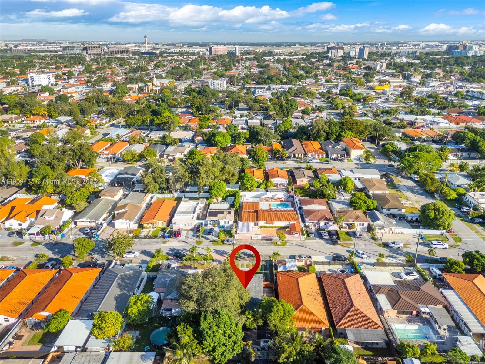 5834 Southwest 4th Street Miami, FL 33144 - Photo 28 of 33 an aerial view of residential houses with outdoor space and parking
