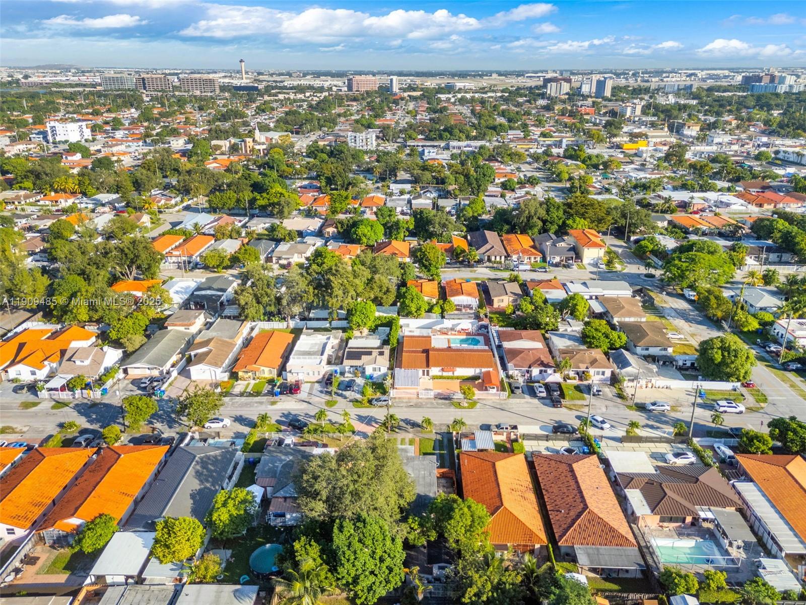 5834 Southwest 4th Street Miami, FL 33144 - Photo 29 of 33 an aerial view of residential houses with outdoor space and trees