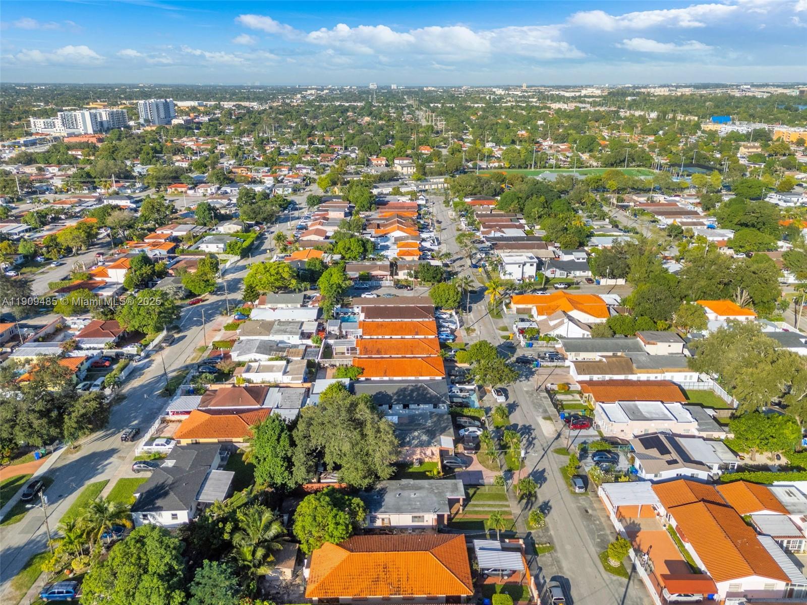 5834 Southwest 4th Street Miami, FL 33144 - Photo 31 of 33 an aerial view of residential houses with outdoor space