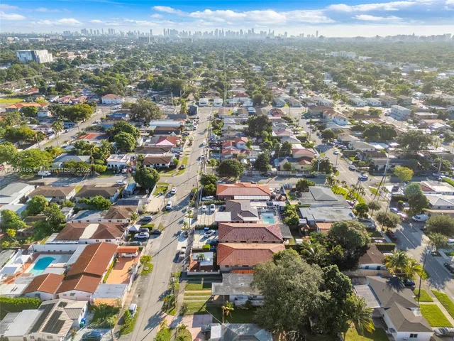an aerial view of a house with a garden
