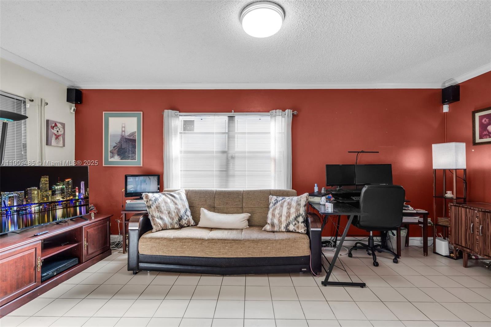 5834 Southwest 4th Street Miami, FL 33144 - Photo 9 of 33 a living room with furniture and a piano