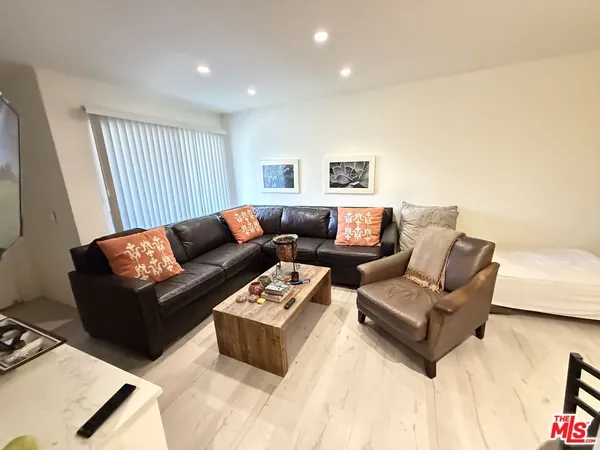 a living room with furniture and a couch