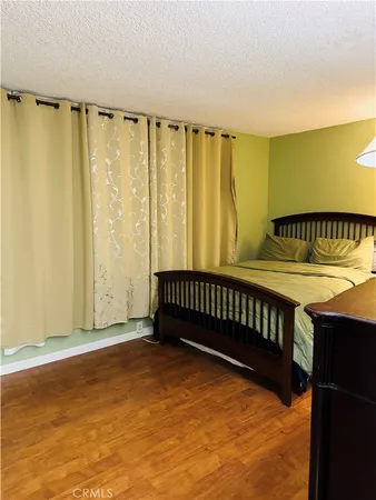 a view of a room with a window and a balcony