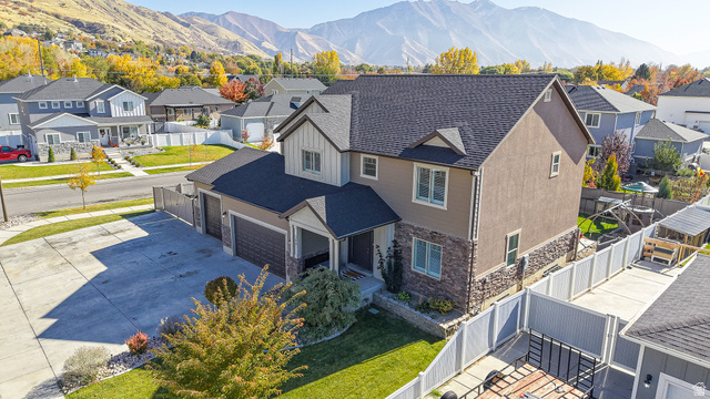 368 East 700 North Springville, UT 84663 - Photo 39 of 55 Aerial perspective of suburban area with mountains