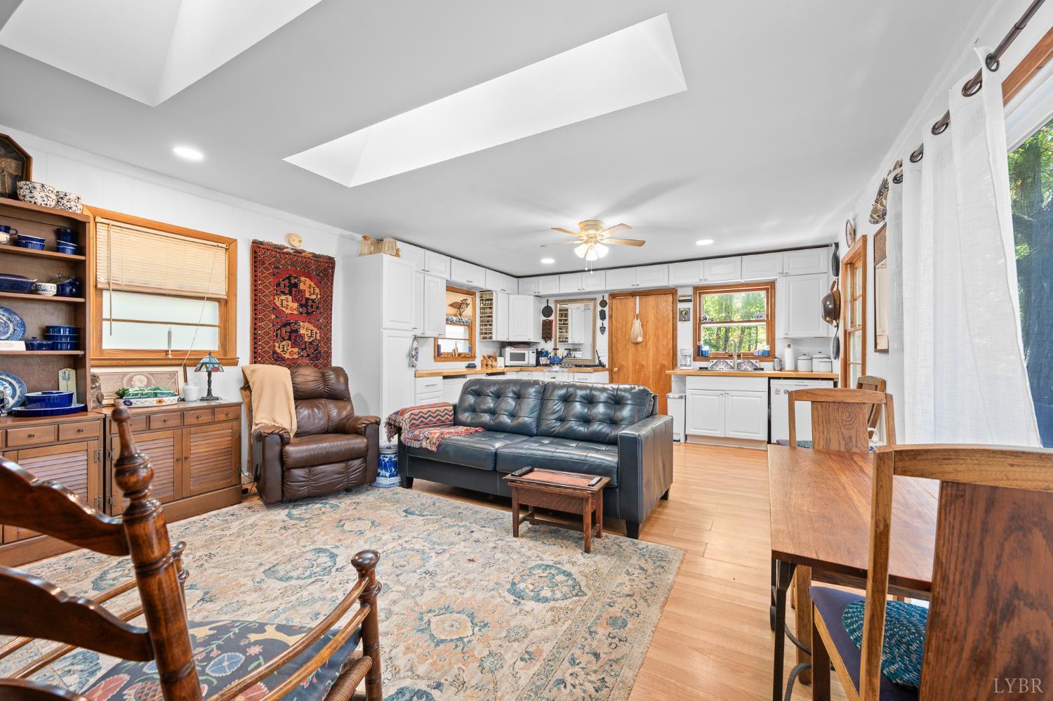 1451 Trellis Ridge Drive Lynch Station, VA 24571 - Photo 14 of 42 a living room with furniture and a wooden floor