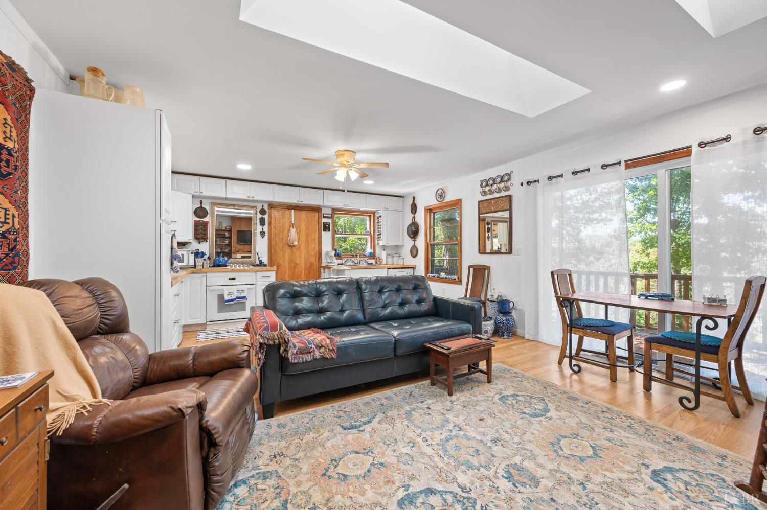 1451 Trellis Ridge Drive Lynch Station, VA 24571 - Photo 15 of 42 a living room with furniture and a large window