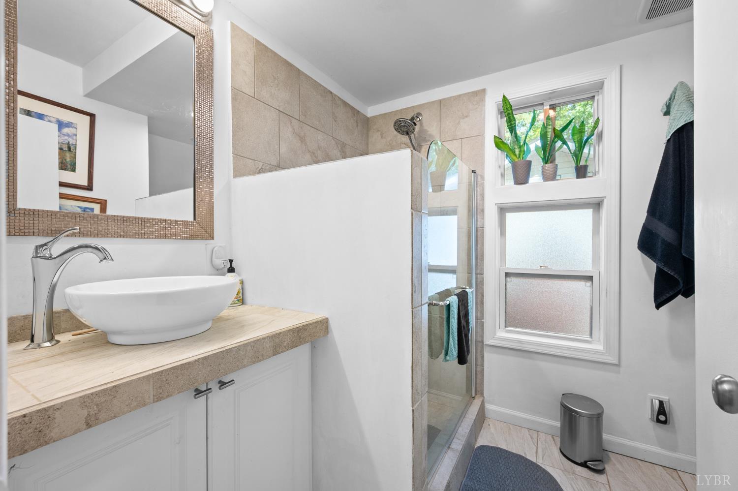 1451 Trellis Ridge Drive Lynch Station, VA 24571 - Photo 23 of 42 a bathroom with a sink toilet and mirror