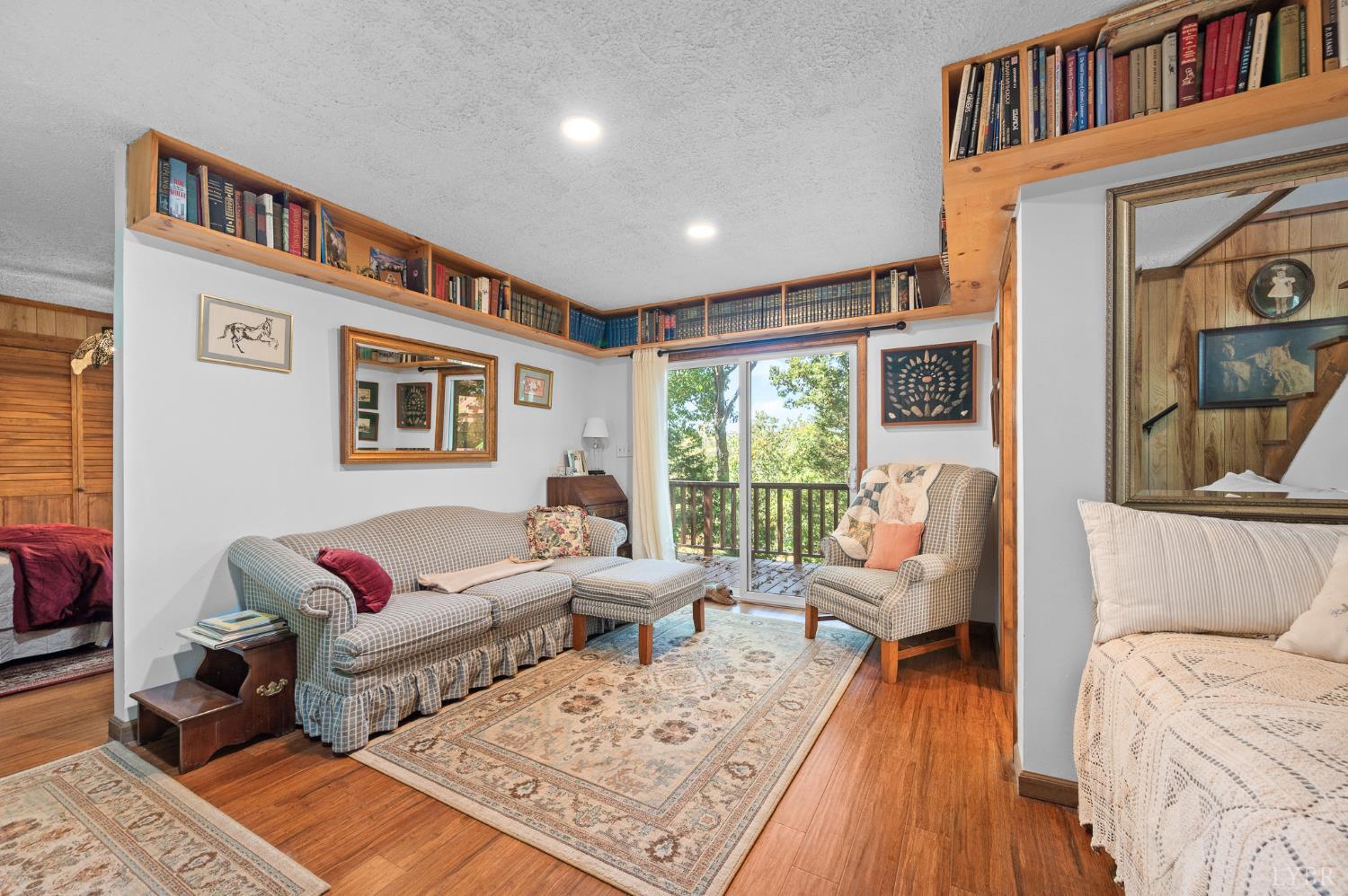 1451 Trellis Ridge Drive Lynch Station, VA 24571 - Photo 24 of 42 a living room with furniture or couch and a wooden floor