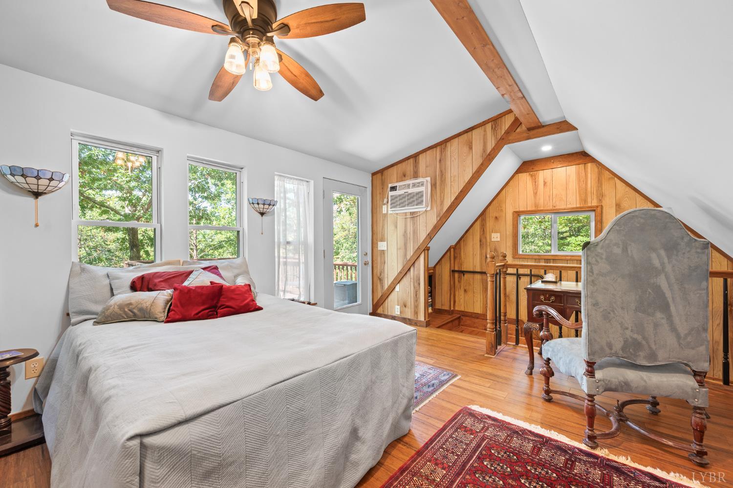 1451 Trellis Ridge Drive Lynch Station, VA 24571 - Photo 27 of 42 a bedroom with a bed and a chandelier
