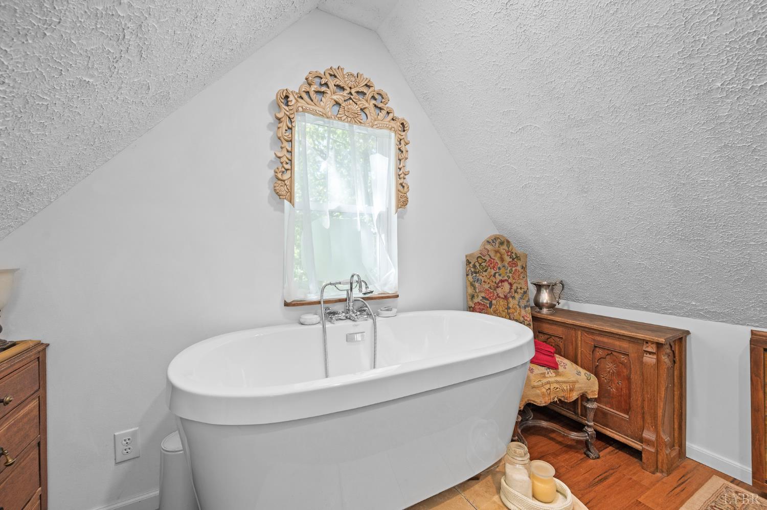 1451 Trellis Ridge Drive Lynch Station, VA 24571 - Photo 29 of 42 a bathroom with a sink and a mirror