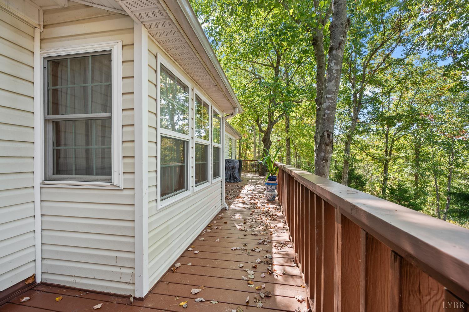 1451 Trellis Ridge Drive Lynch Station, VA 24571 - Photo 36 of 42 a view of a balcony with wooden floor and fence