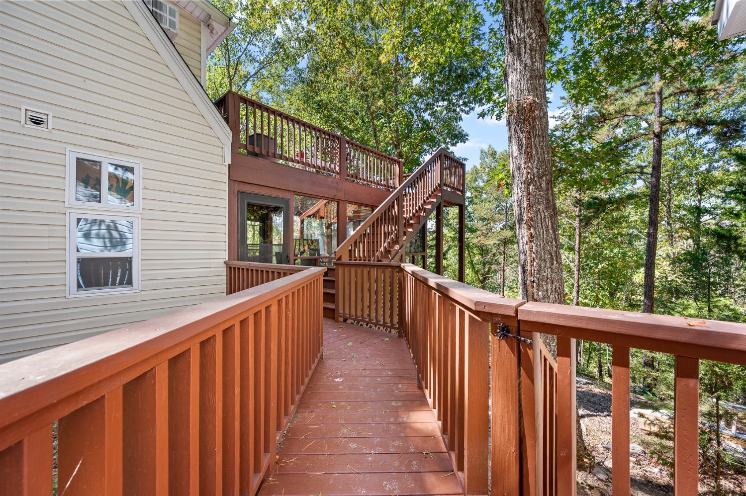 1451 Trellis Ridge Drive Lynch Station, VA 24571 - Photo 38 of 42 a view of balcony with wooden stairs and wooden stairs
