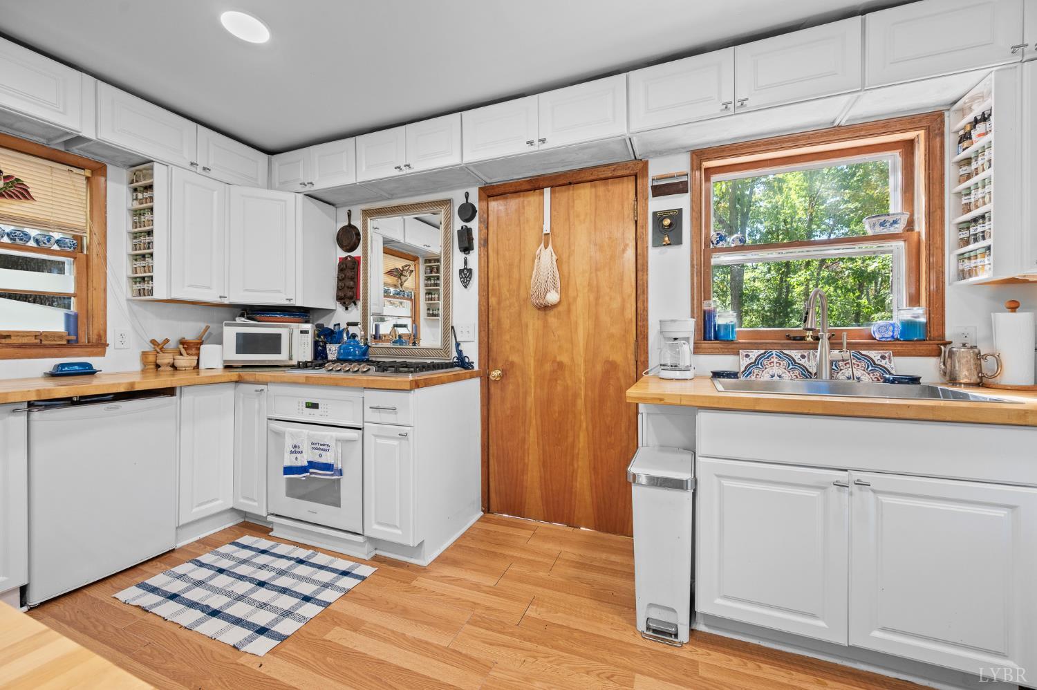 1451 Trellis Ridge Drive Lynch Station, VA 24571 - Photo 10 of 42 a kitchen with a sink cabinets and window