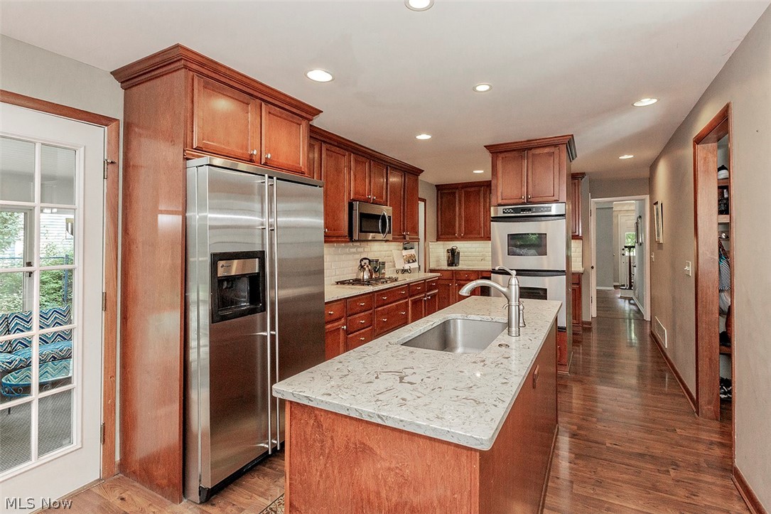2946 Boyce Road Shaker Heights, OH 44122 - Photo 6 of 31 Granite Counters & Stainless Appliances surround the center island