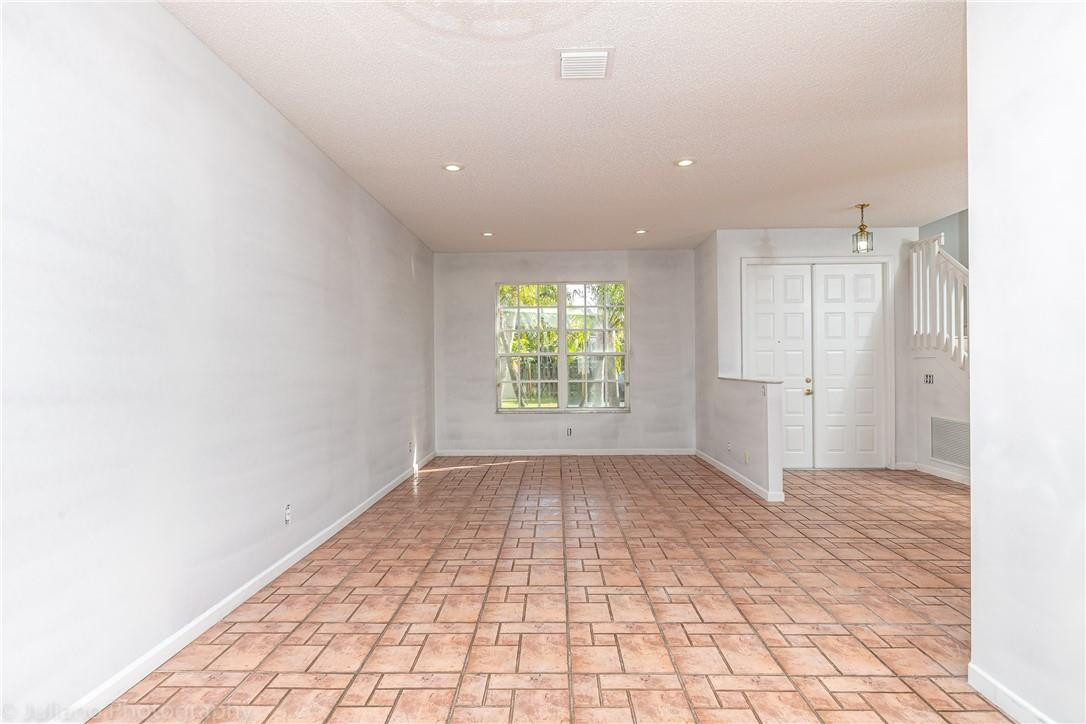18011 Samba Lane Boca Raton, FL 33496 - Photo 8 of 53 a view of an empty room and window