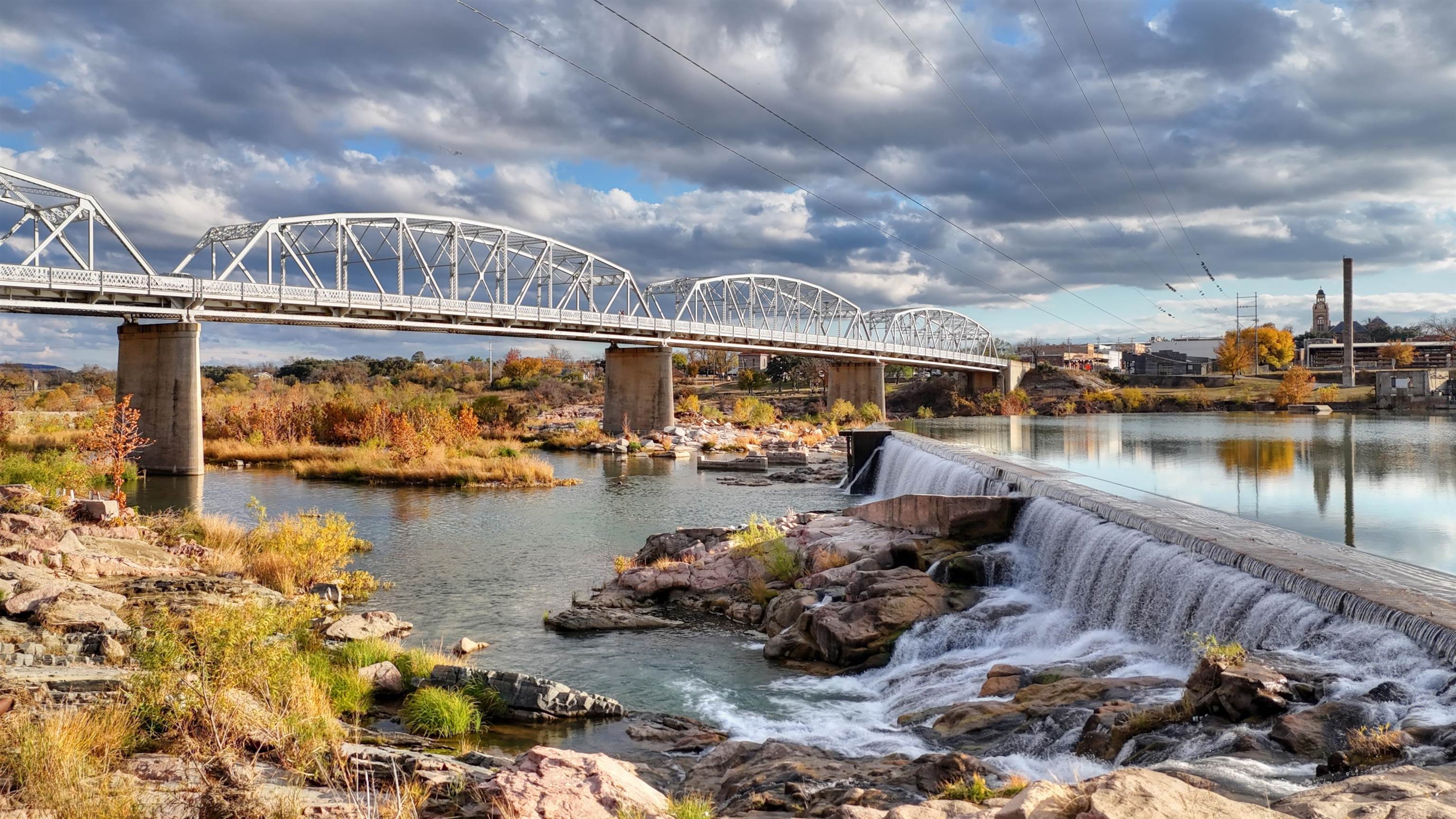 2 Walden Way Llano, TX 78643 - Photo 20 of 33 a view of a lake with a car parked in front of house