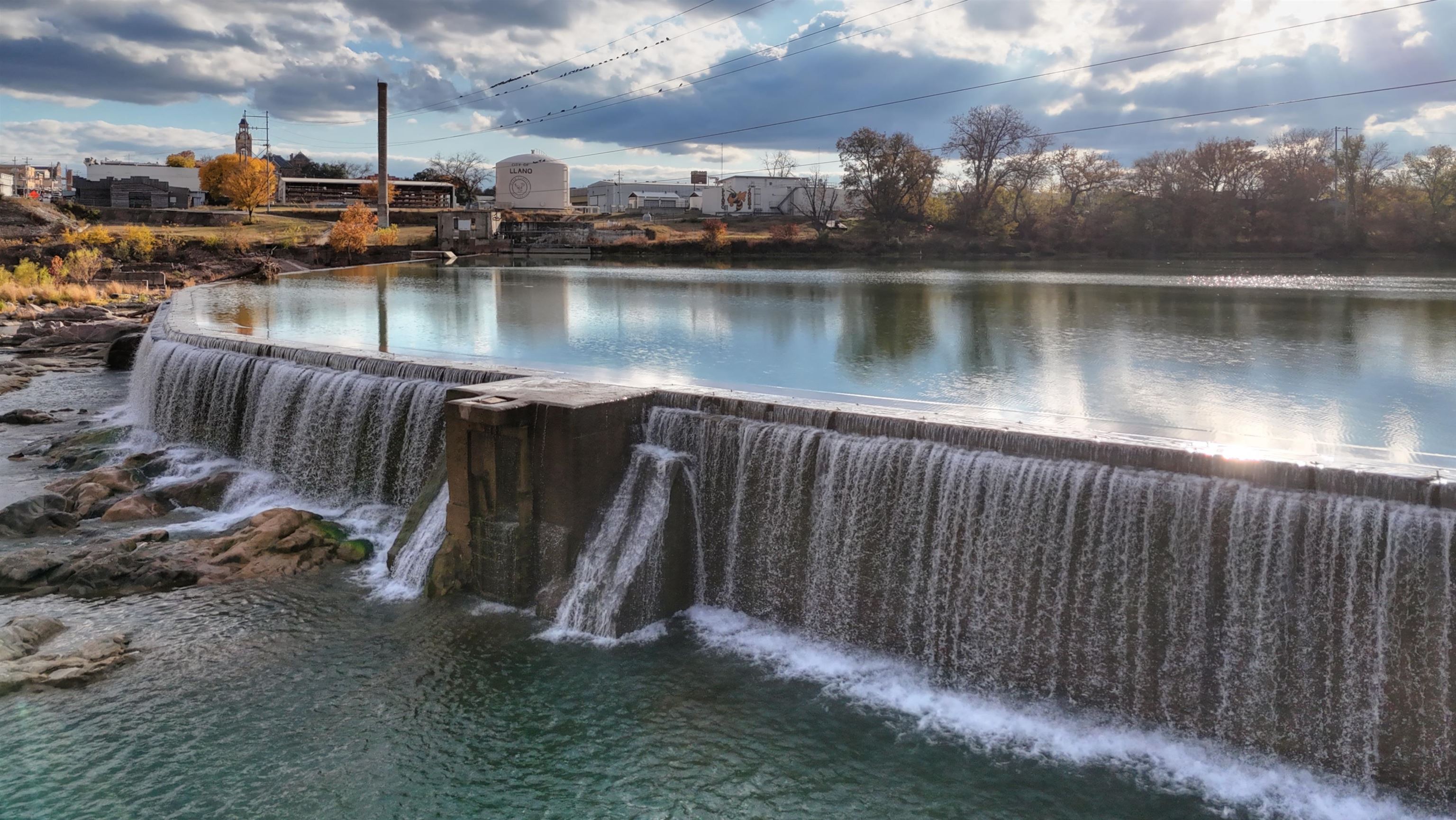 2 Walden Way Llano, TX 78643 - Photo 25 of 33 a view of a lake with boats and trees in the background