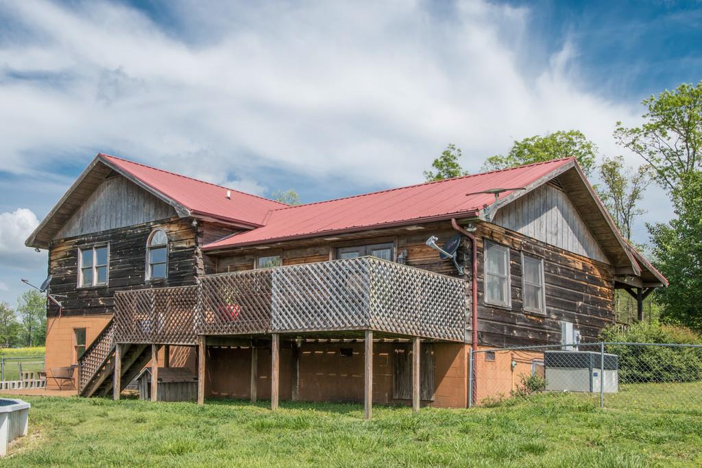 6815 Williams Road Cross Plains, TN 37049 - Photo 21 of 26 a front view of a house with a porch