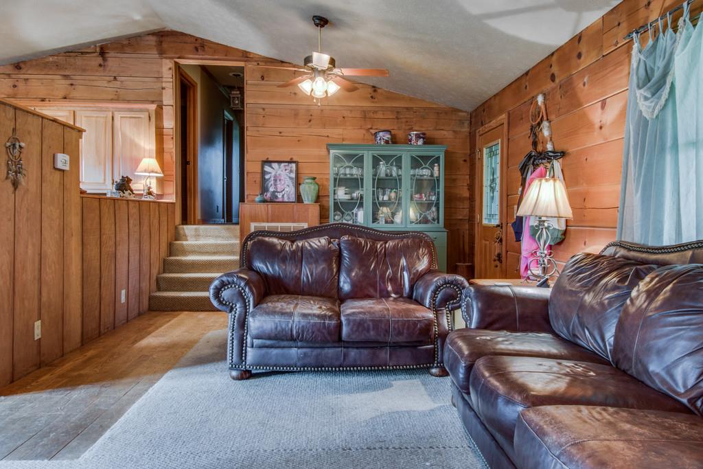6815 Williams Road Cross Plains, TN 37049 - Photo 7 of 26 a living room with a couch and a large window