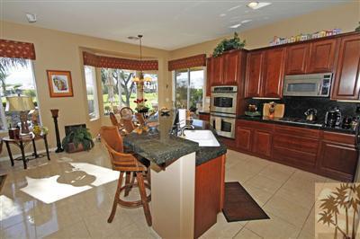 80555 Knightswood Road Indio, CA 92201 - Photo 9 of 25 a view of a dining room with furniture window and outside view