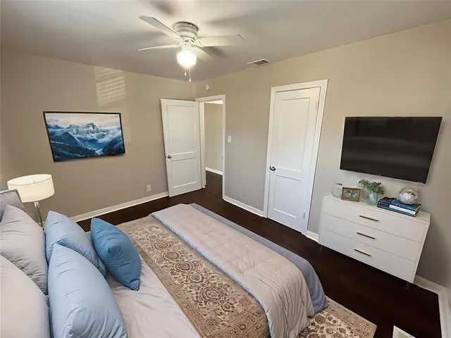 a bathroom with a toilet a sink and bathtub