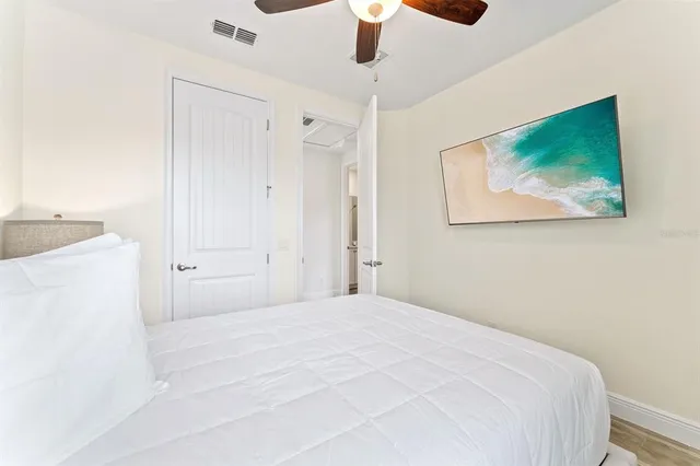 an aerial view of a house with a lake view