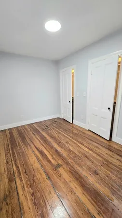 a view of small space with racks on the wall