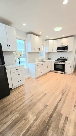a utility room with washer and dryer