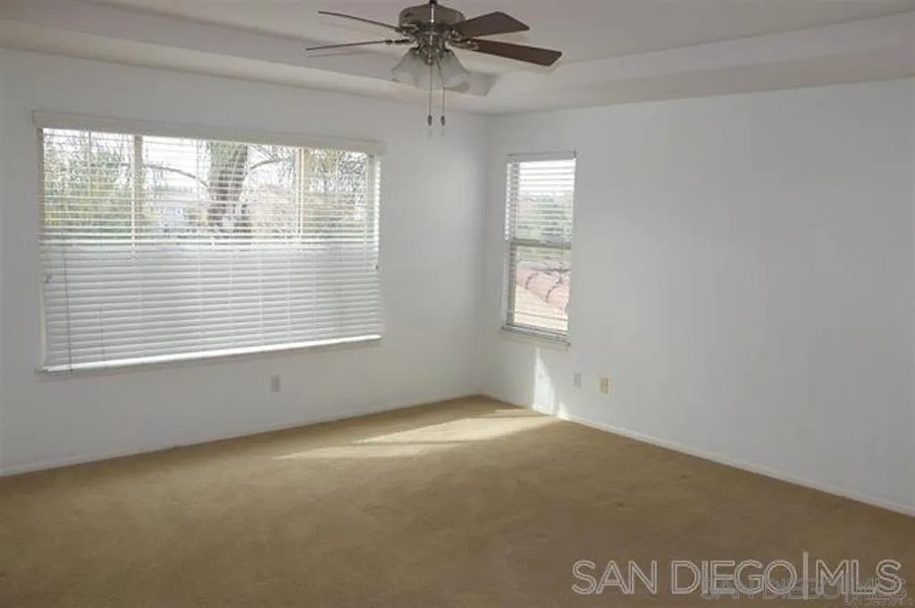 1586 Hopscotch Drive Chula Vista, CA 91915 - Photo 4 of 7 a view of an empty room with a window