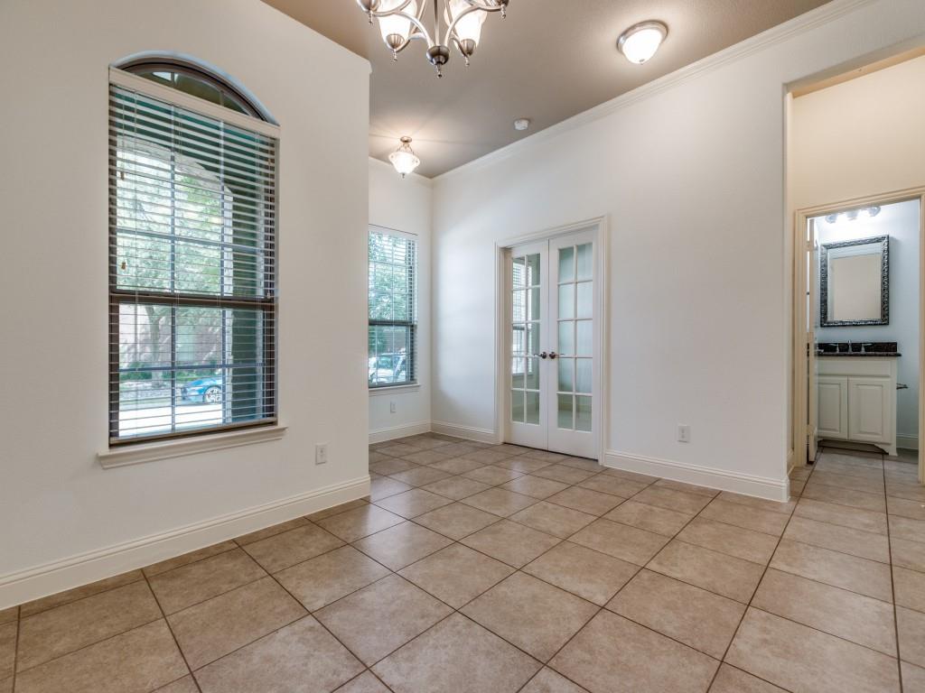 4696 Cecile Road Plano, TX 75024 - Photo 13 of 26 a view of an empty room with window and cabinet