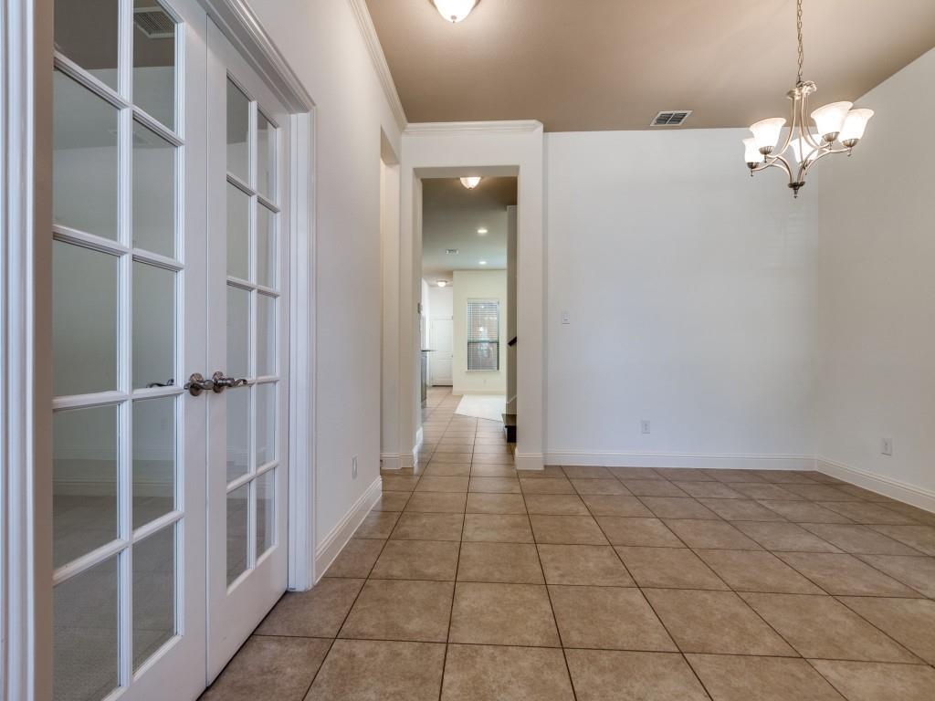 4696 Cecile Road Plano, TX 75024 - Photo 14 of 26 a view of an empty room with a mirror