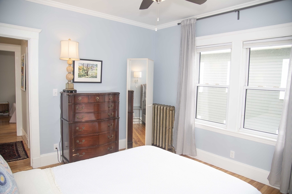 3 Chester Road, Unit 3 Belmont, MA 02478 - Photo 28 of 40 a bedroom with a bed and a window