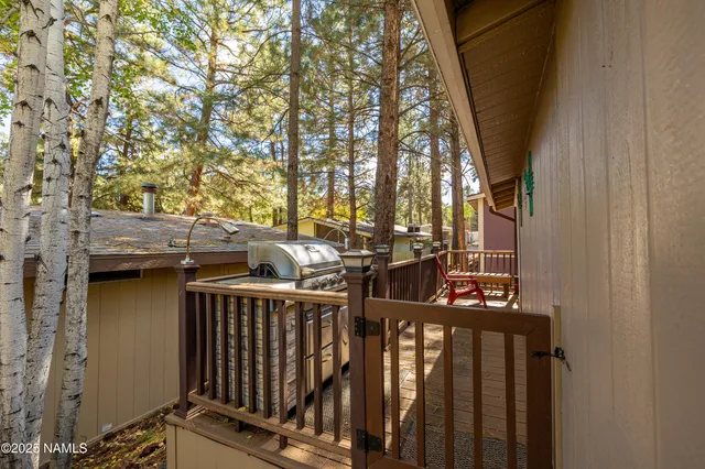 a view of a balcony with chairs