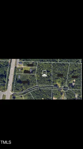 a view of a yard with an outdoor space