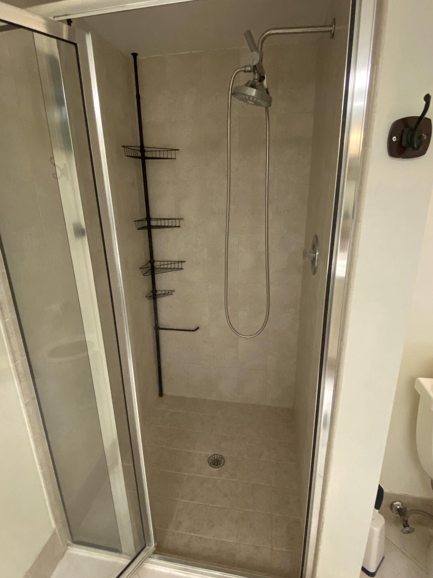 5621 Coach House Circle, Unit D Boca Raton, FL 33486 - Photo 24 of 29 a bathroom with a shower