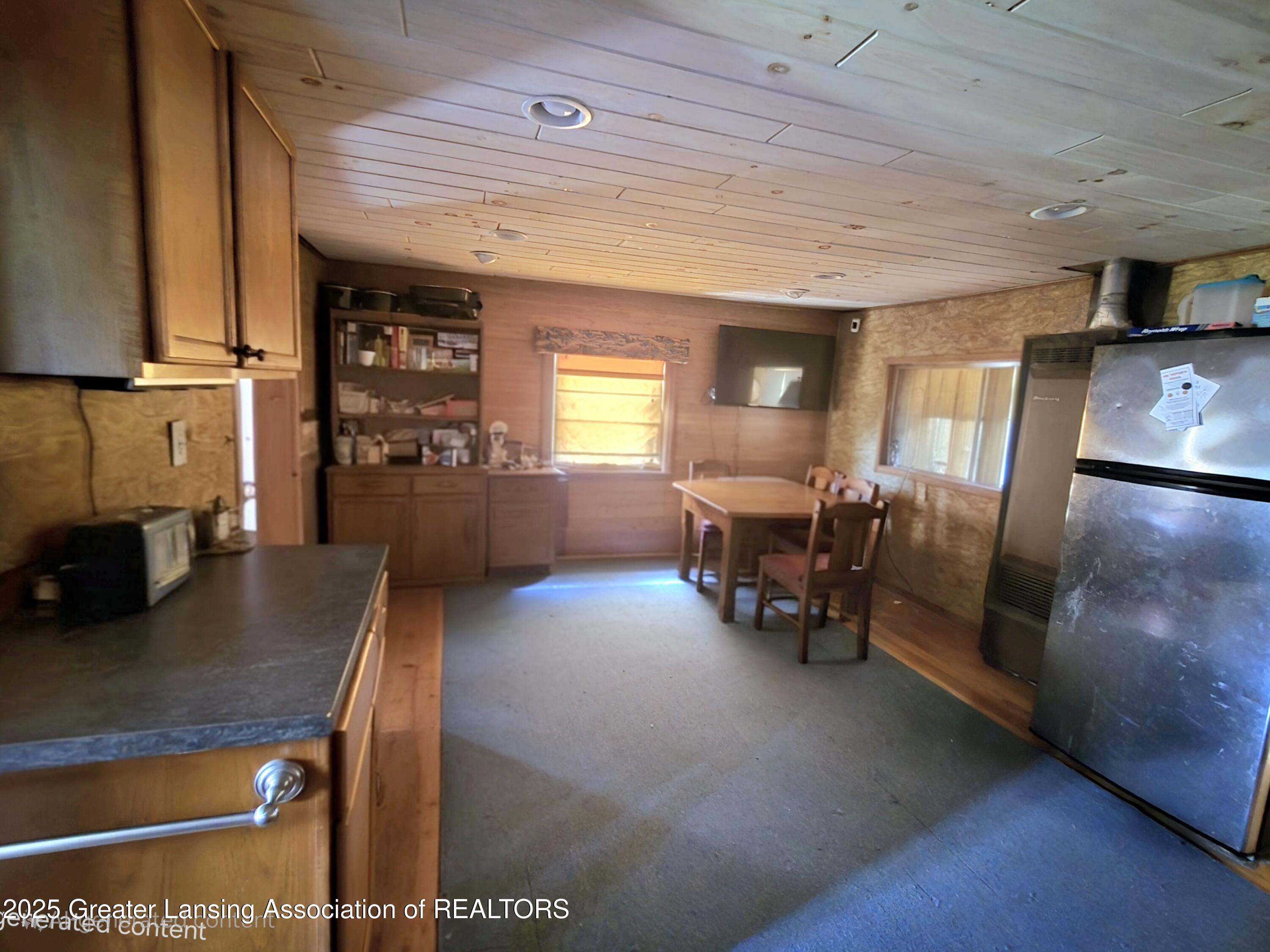 6574 Sawmill Road Harrison, MI 48625 - Photo 6 of 18 Sawmill dinning 2