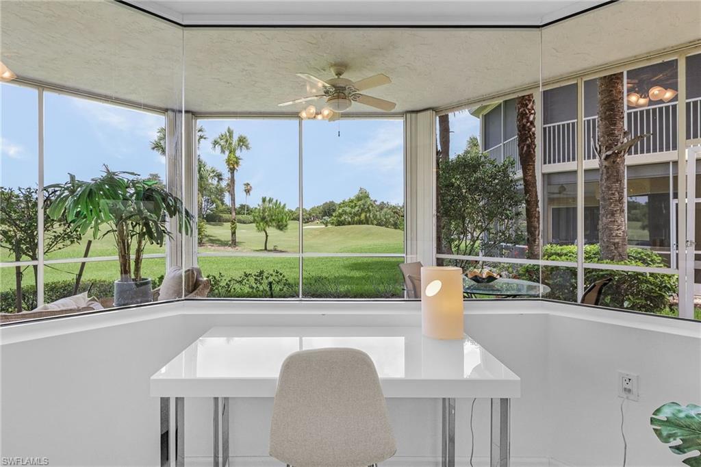 20240 Burnside Place, Unit 1603 Estero, FL 33928 - Photo 18 of 41 a view of a dining room with a table and chairs