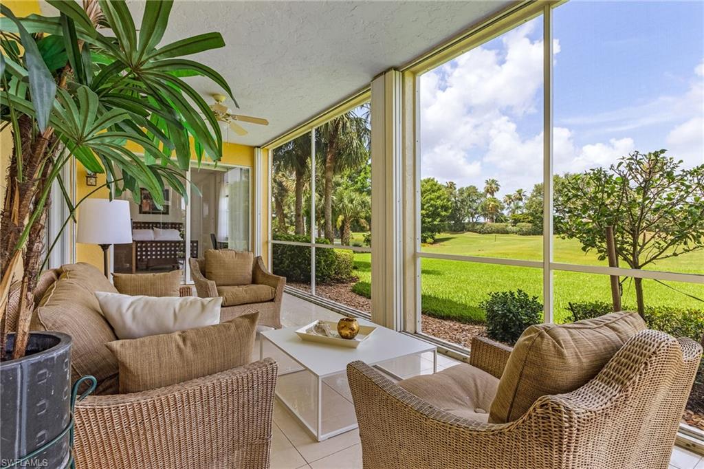 20240 Burnside Place, Unit 1603 Estero, FL 33928 - Photo 33 of 41 a outdoor living space with patio furniture and a garden