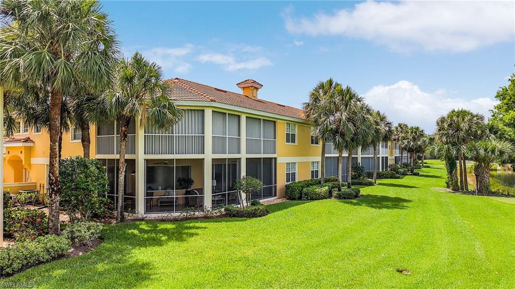 20240 Burnside Place, Unit 1603 Estero, FL 33928 - Photo 36 of 41 a view of a house with swimming pool and sitting area